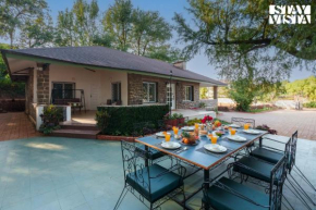 The Deck by StayVista - Country house architecture, Meticulously landscaped lawns & a captivating valley view